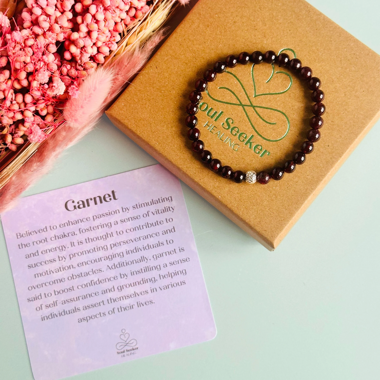 Garnet bracelet with a faceted sterling silver or gold vermeil focal bead. A bracelet for passion, success and confidence. Made with 6mm beads.
