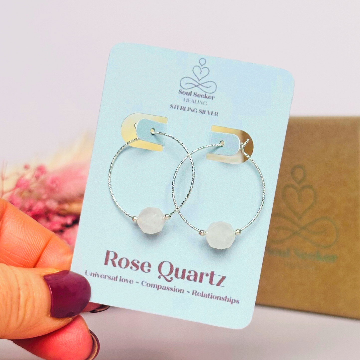 Rose Quartz sterling silver hoop earrings featuring 8mm star cut rose quartz beads on 25mm sparkle cut sterling silver hoops.