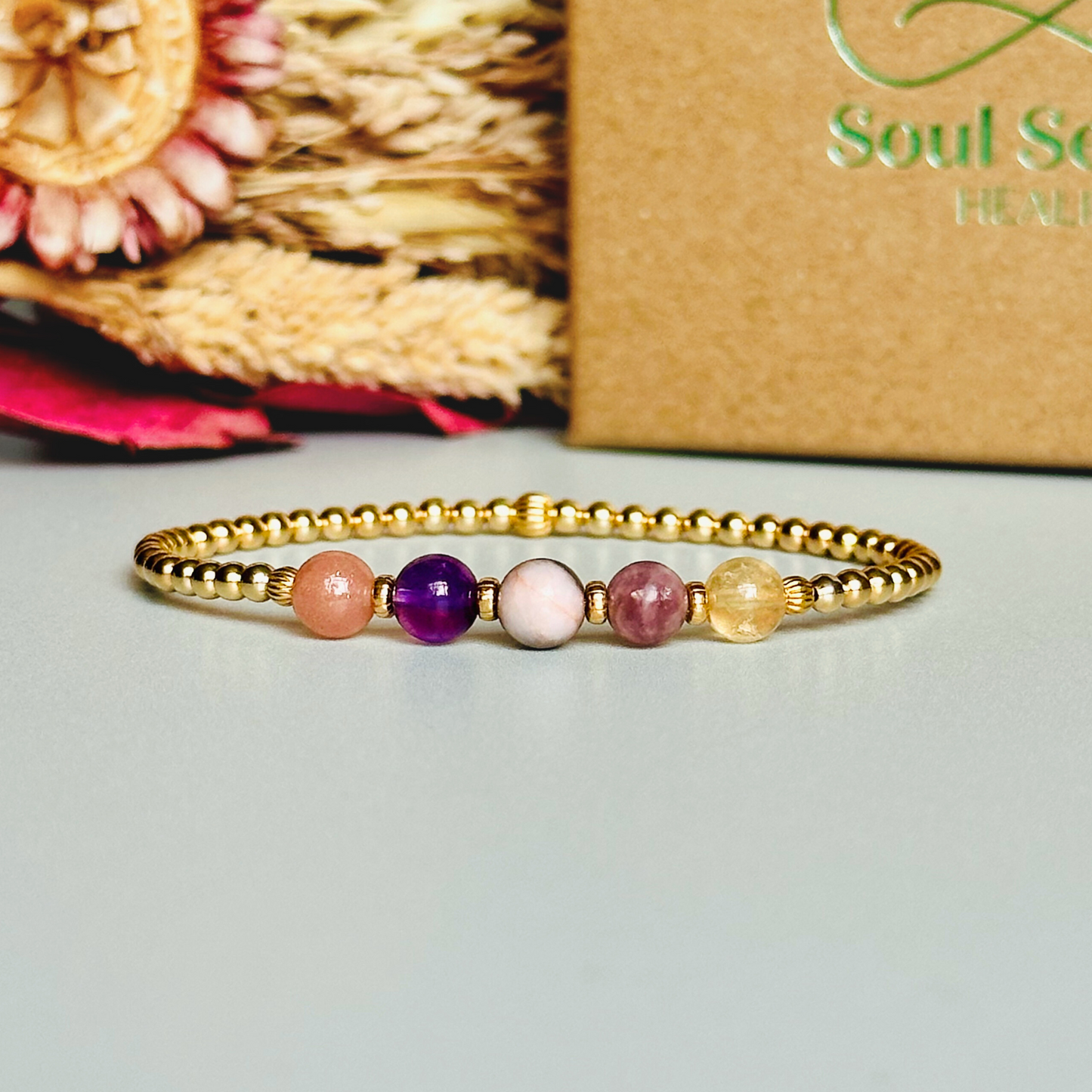This gold vermeil menopause bracelet is made with a selection of five healing crystals all believed to help deal with menopause symptoms. The crystal beads are all 6mm and are on a band of 3mm gold vermeil beads with corrugated accent beads.
