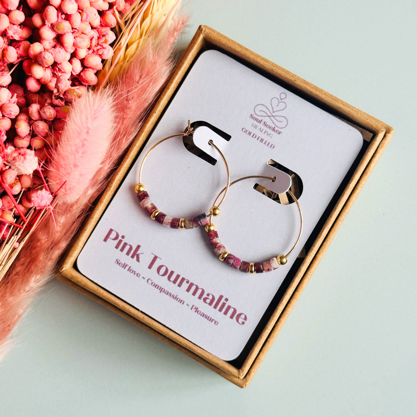 Pink tourmaline gold filled hoop earrings. Made with pink tourmaline heishi beads on 25mm gold filled hoops.
