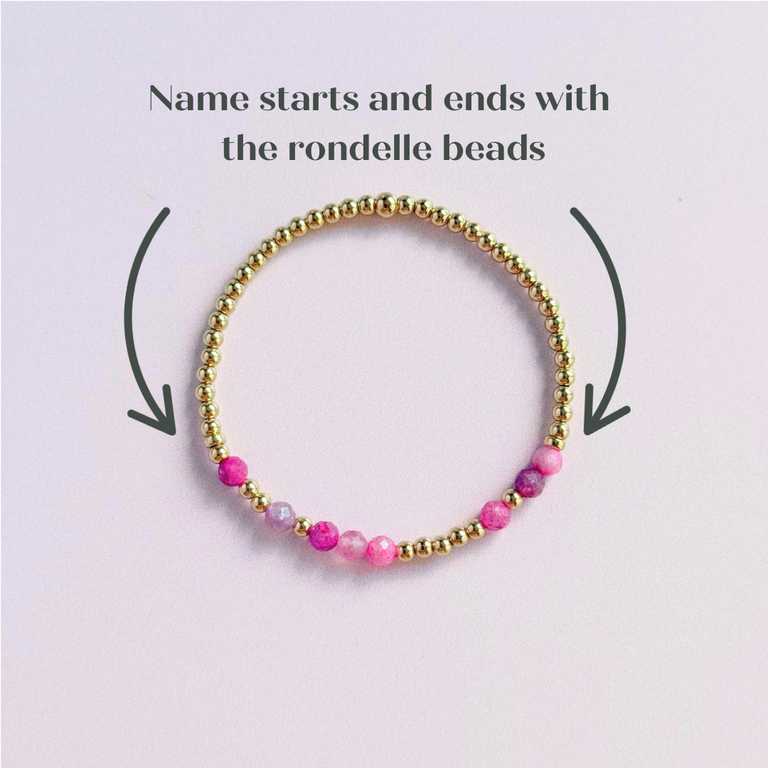 Morse code secret message bracelet spelling out your chosen name in gold filled and pink tourmaline crystal beads. Elasticated with 4mm faceted pink tourmaline beads and 3mm gold filled beads. Custom October birthstone bracelet.