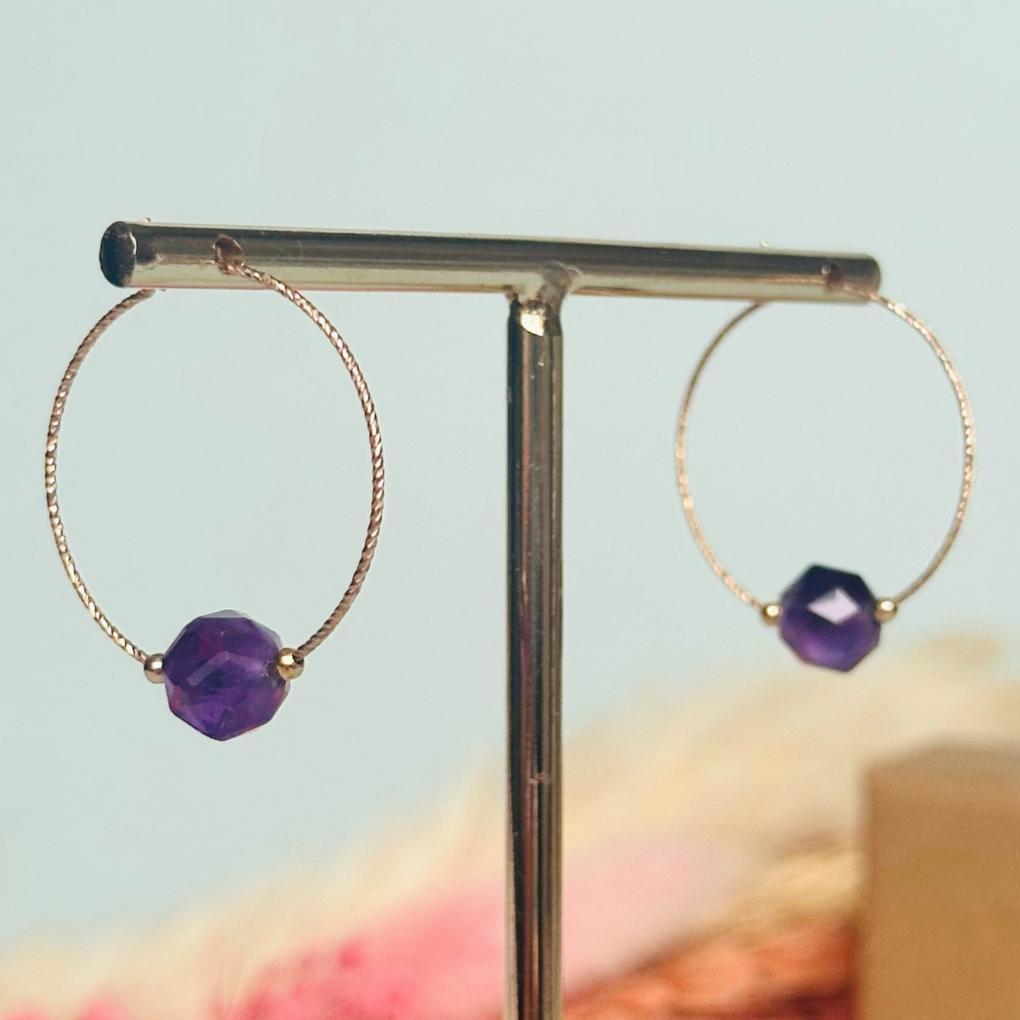 Amethyst gold filled hoop earrings featuring 8mm star cut amethyst beads on 25mm sparkle cut gold filled hoops.