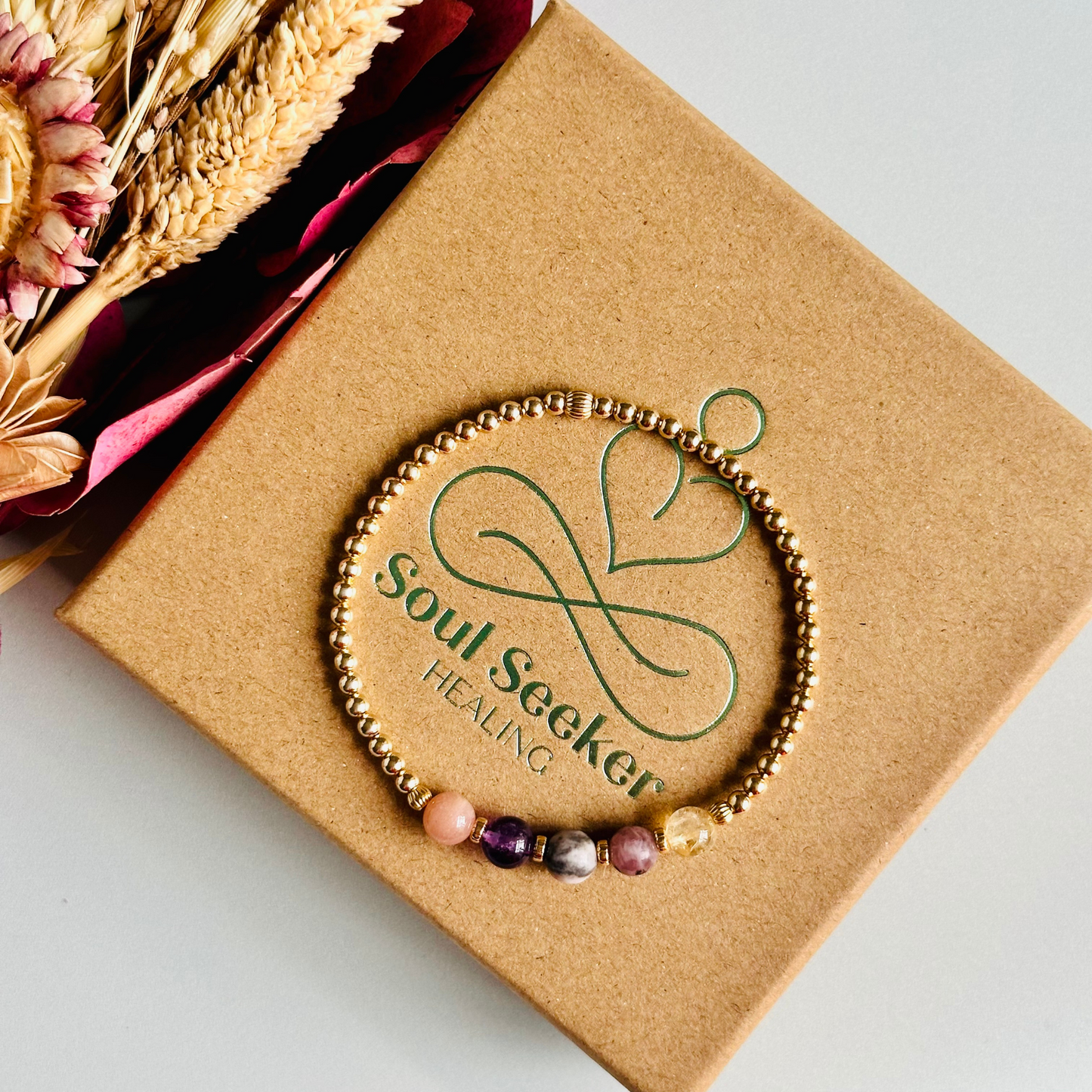 This gold vermeil menopause bracelet is made with a selection of five healing crystals all believed to help deal with menopause symptoms. The crystal beads are all 6mm and are on a band of 3mm gold vermeil beads with corrugated accent beads.