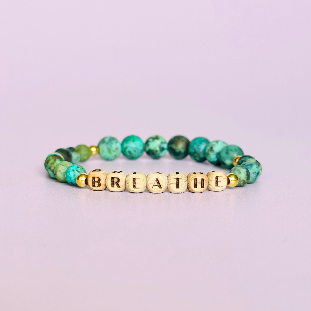 Breathwork bracelet featuring 6mm and 8mm frosted African turquoise crystal beads that follow the 4-7-8 counted breathing method. Also featuring laser engraved wooden letter beads spelling out the word BREATHE. Choose your accent beads from rose gold vermeil, gold vermeil or sterling silver.