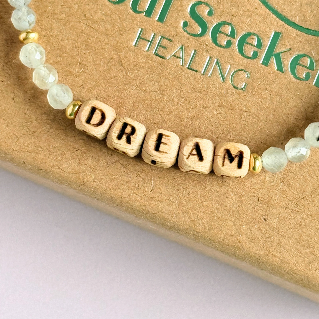 Bracelet featuring 5mm engraved wooden beads, which you can personalise with your choice of words, numbers and symbols. The main the band of the bracelet is made with 4mm faceted labradorite round crystal gemstone beads. Finished with your choice of gold vermeil, sterling silver or rose gold vermeil accent beads.