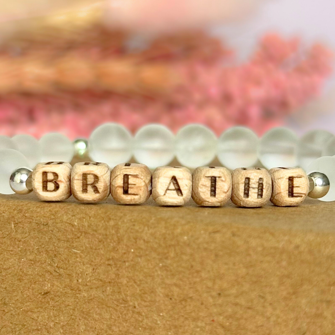 Breathwork bracelet featuring 6mm and 8mm frosted clear quartz crystal beads that follow the 4-7-8 counted breathing method. Also featuring laser engraved wooden letter beads spelling out the word BREATHE. Choose your accent beads from rose gold vermeil, gold vermeil or sterling silver.