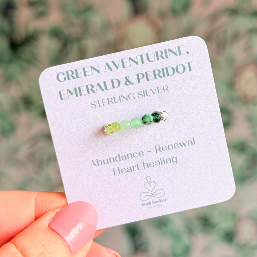 Sterling silver band style ombré ring with multicolour 3mm faceted peridot, green aventurine and emerald beads with a beaded band of 2.5 mm sterling silver round beads. Elasticated for comfort.