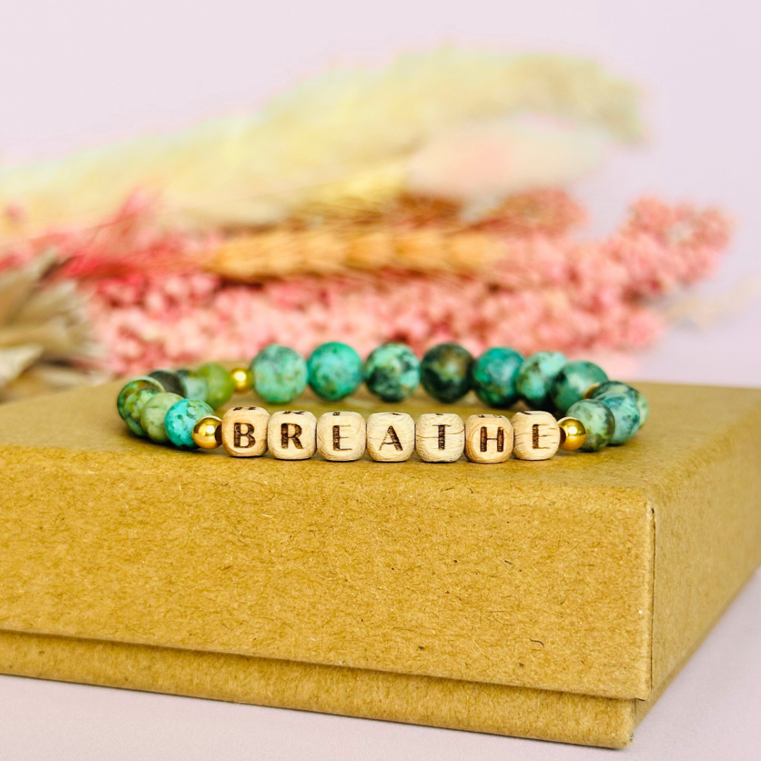Breathwork bracelet featuring 6mm and 8mm frosted African turquoise crystal beads that follow the 4-7-8 counted breathing method. Also featuring laser engraved wooden letter beads spelling out the word BREATHE. Choose your accent beads from rose gold vermeil, gold vermeil or sterling silver.