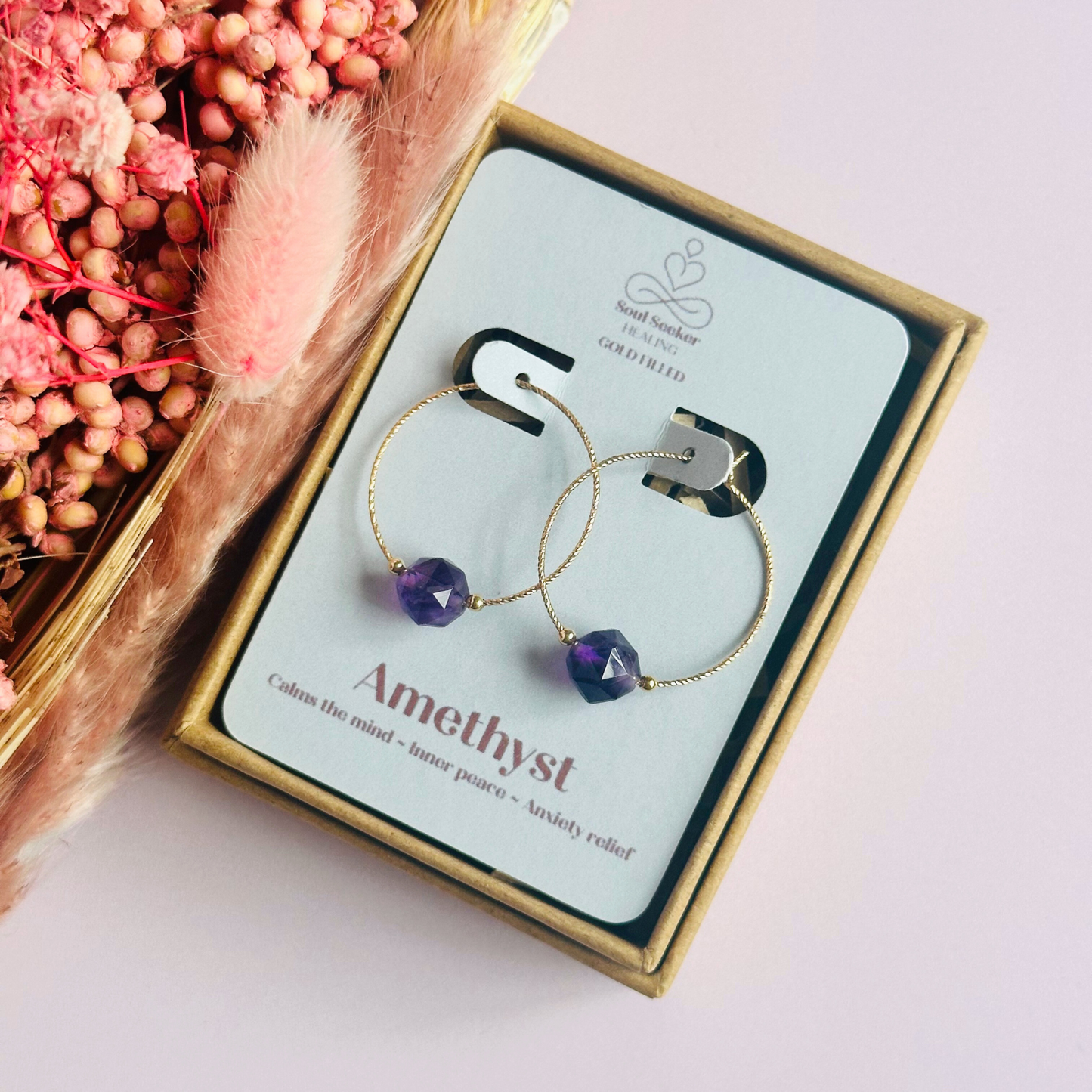 Amethyst gold filled hoop earrings featuring 8mm star cut amethyst beads on 25mm sparkle cut gold filled hoops.