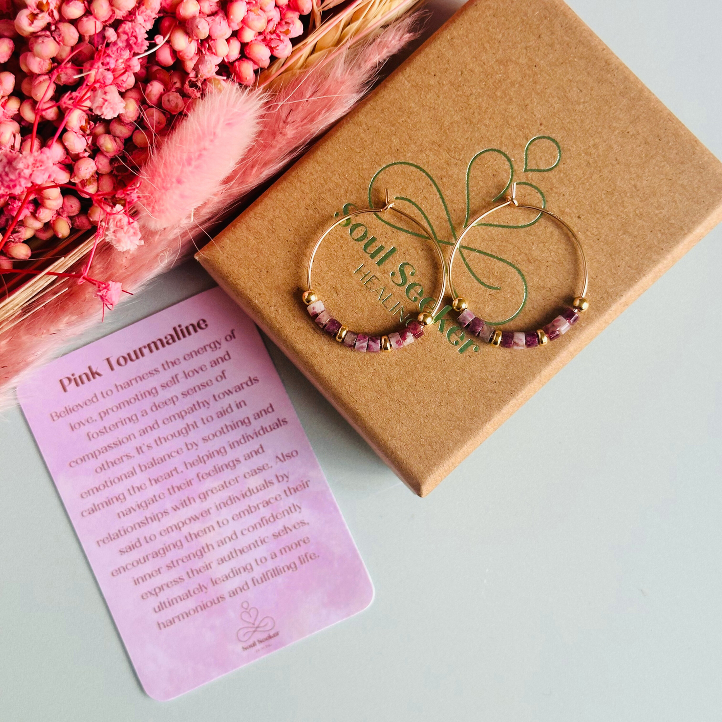 Pink tourmaline gold filled hoop earrings. Made with pink tourmaline heishi beads on 25mm gold filled hoops.