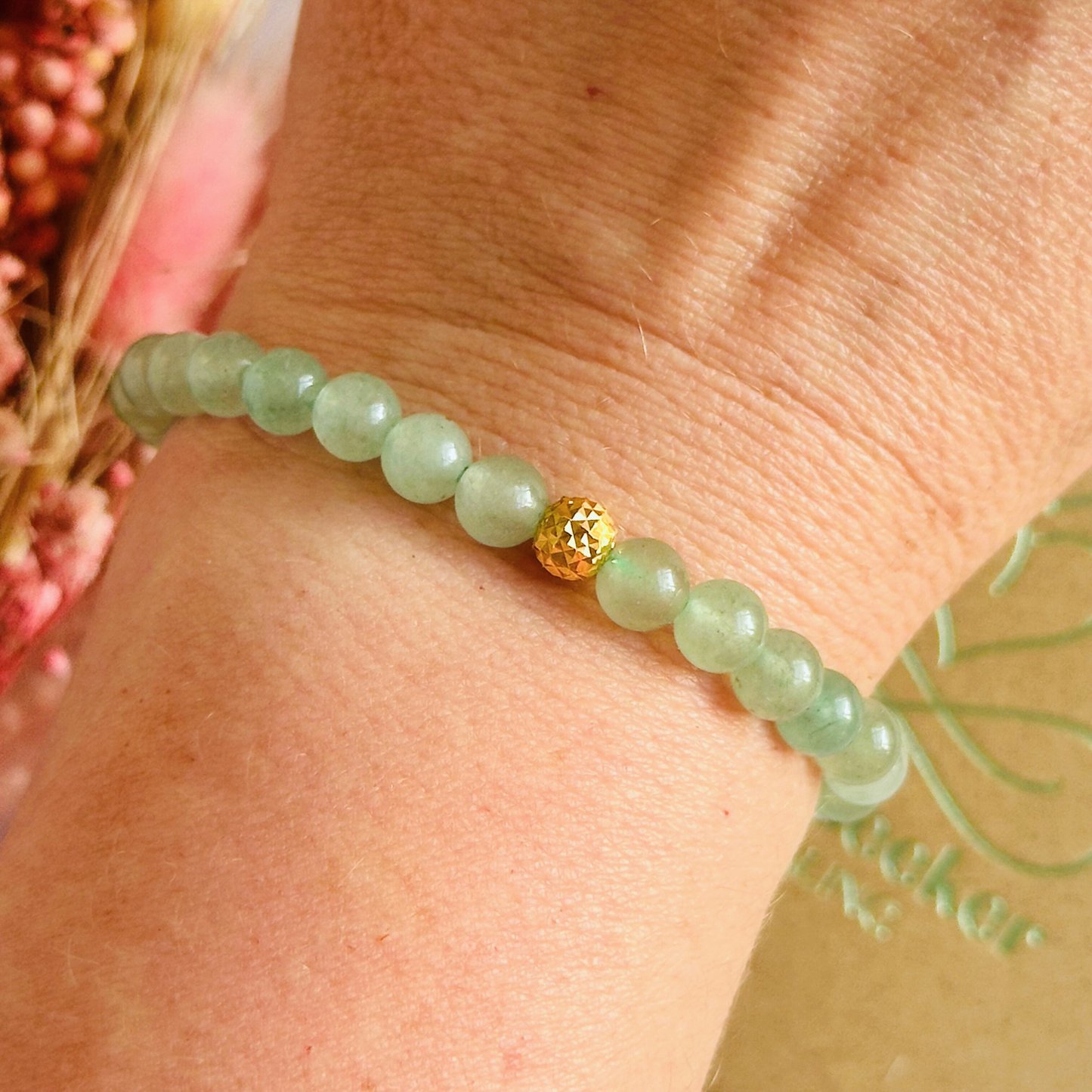 Green aventurine bracelet with a faceted gold vermeil focal bead. A bracelet for prosperity, empathy, abundance and harmony. Made with 6mm beads.