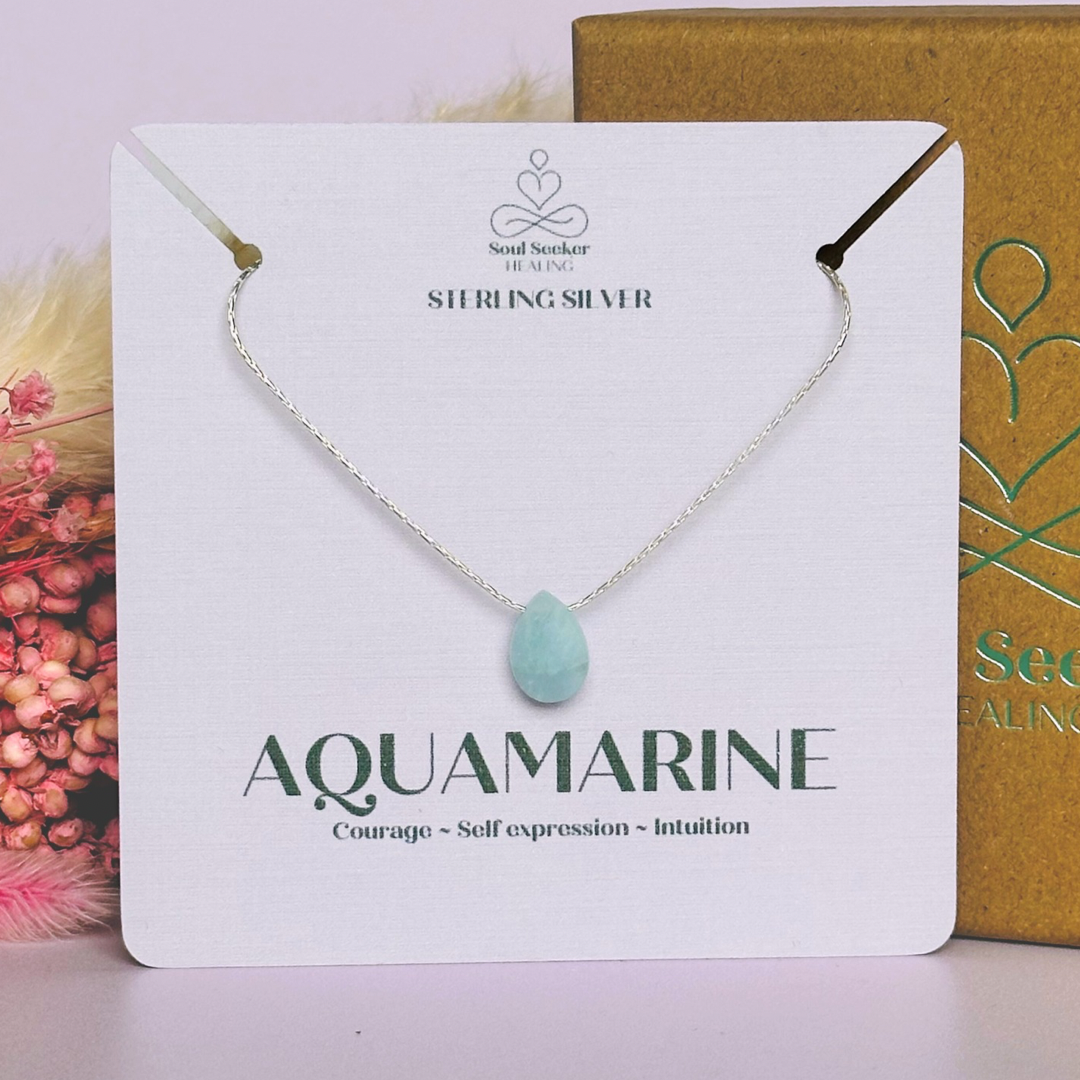 Dainty aquamarine teardrop necklace featuring a 12x8mm faceted aquamarine teardrop bead on a fine sterling silver cardano beading chain.