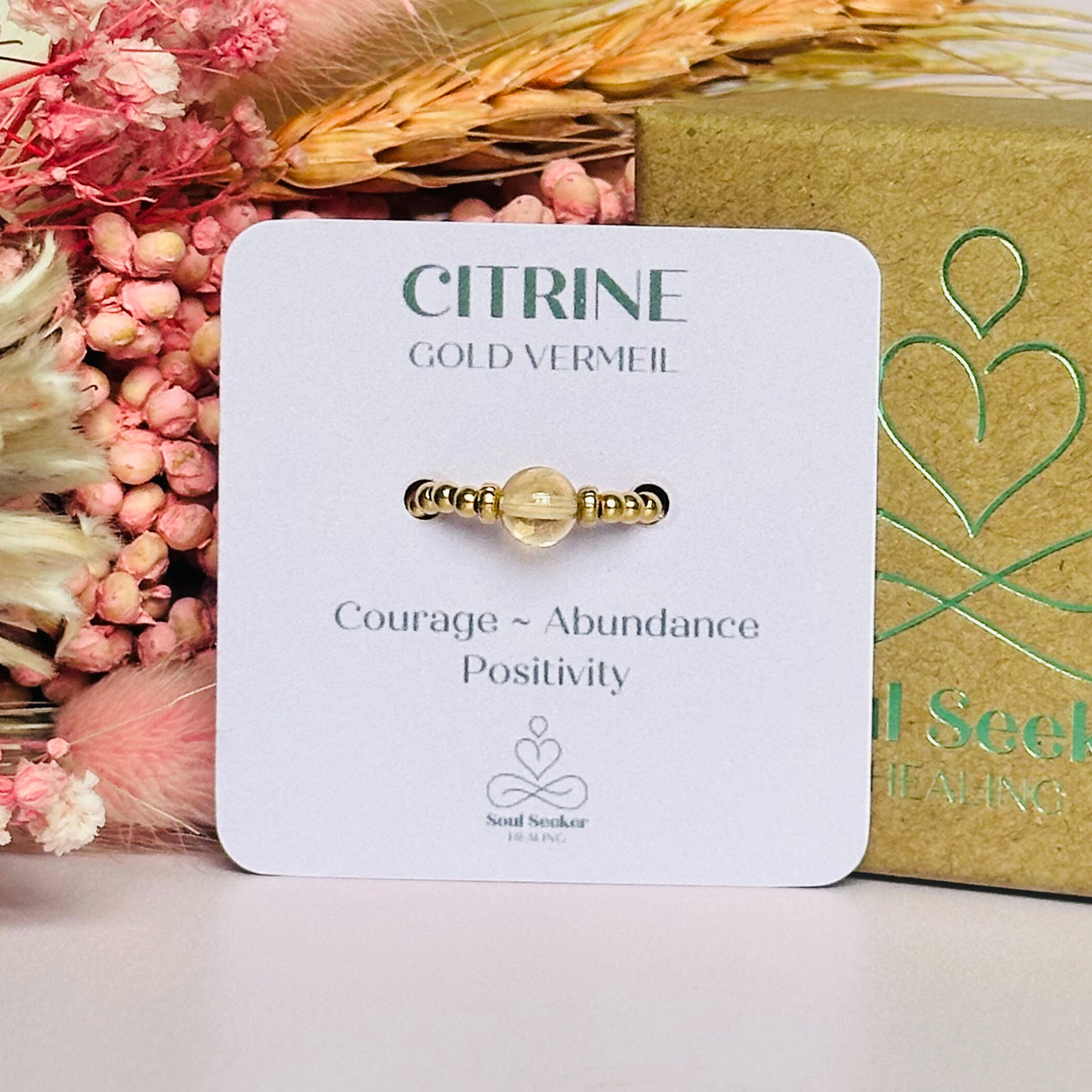 Citrine ring featuring a 6mm round citrine bead, flanked by gold vermeil rondelle beads on a gold vermeil elasticated band. November birthday ideas, November birthday gift, November birthstone ring, stretch ring, November jewellery, born in November