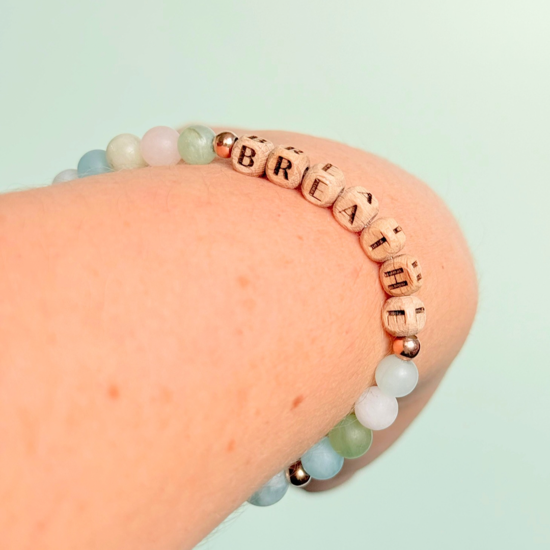 Breathwork bracelet featuring 6mm and 8mm frosted crystal beads that follow the 4-7-8 counted breathing method. Also featuring laser engraved wooden letter beads spelling out the word BREATHE. Choose your accent beads from rose gold vermeil, gold vermeil or sterling silver.