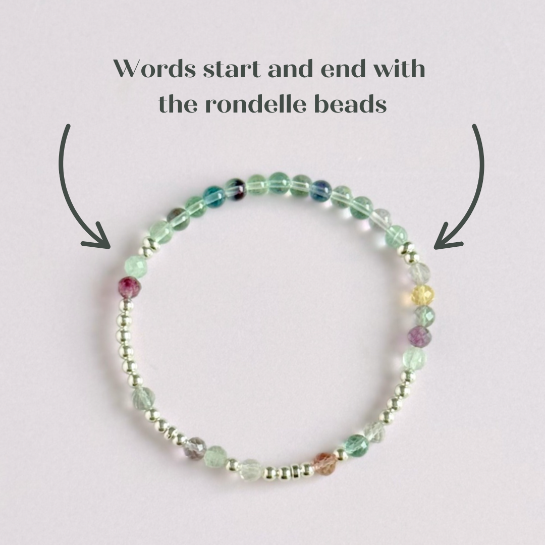 Elasticated stretch fluorite crystal morse code bracelet spelling out the words ‘ADHD and awesome’ in a combination of 4mm round fluorite beads, 4mm faceted fluorite beads and either sterling silver or gold vermeil 3mm round beads. The words start and end at the rondelle spacer beads.