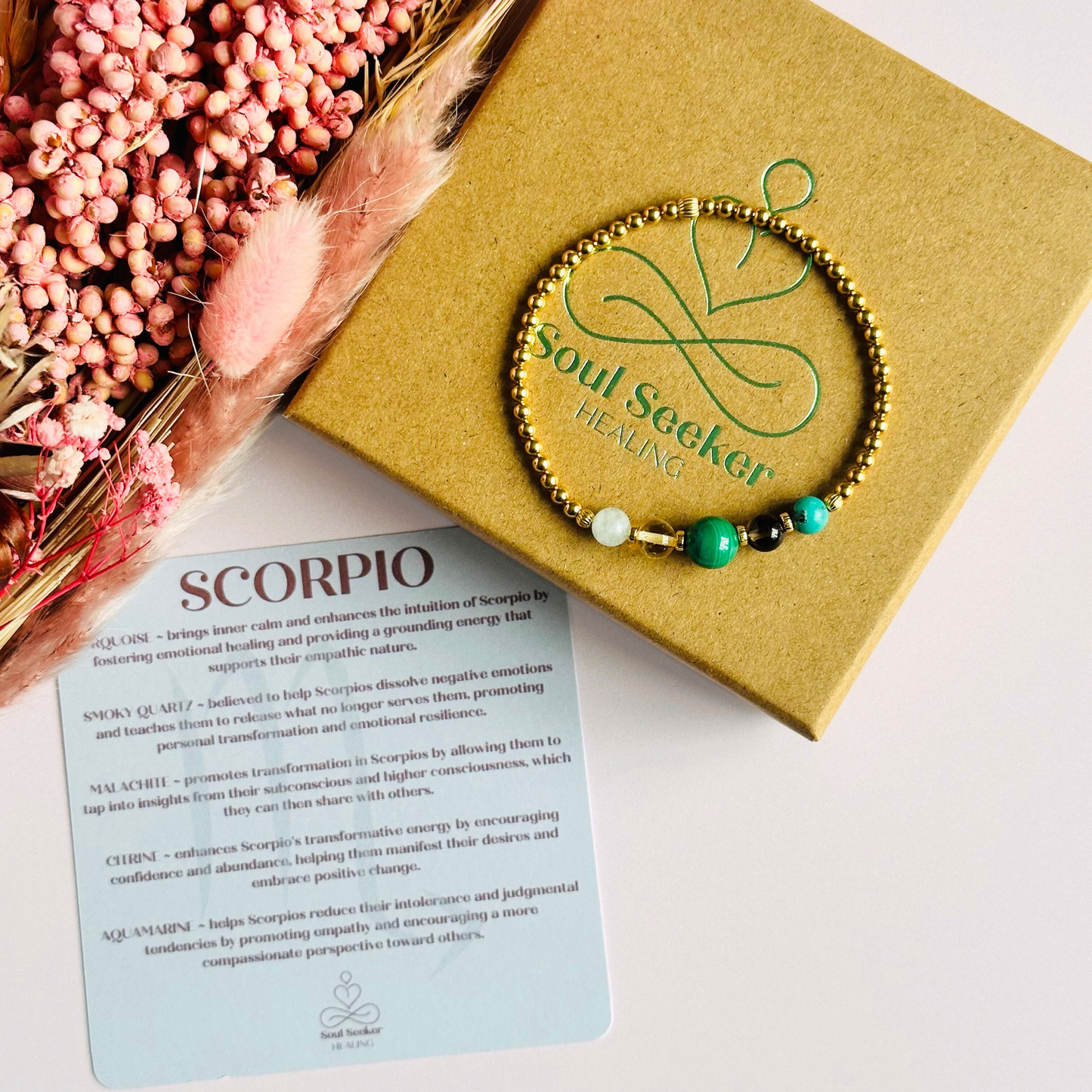 This gold vermeil Scorpio bracelet is made with a selection of five healing crystals all believed to resonate with the Scorpio zodiac sign. The central bead is 8mm, the other four are 6mm. On an elasticated band of 3mm gold vermeil beads with corrugated accent beads. Featuring aquamarine, citrine, malachite, smoky quartz and turquoise.