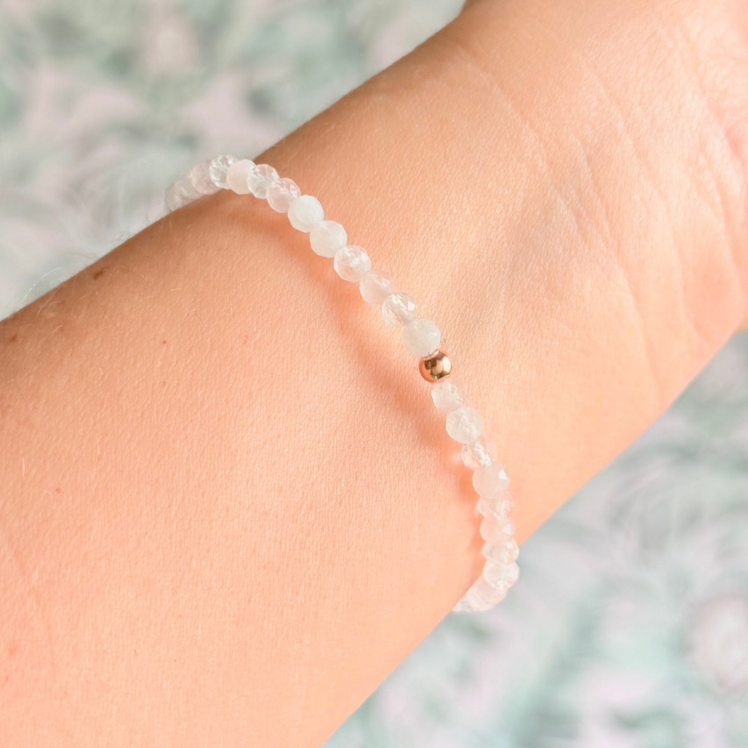Bracelet featuring 5mm engraved wooden beads which you can personalise with your choice of words, numbers and symbols. The main the band of the bracelet is made with 4mm faceted rose quartz round crystal gemstone beads. Finished with your choice of gold vermeil, sterling silver or rose gold vermeil accent beads.