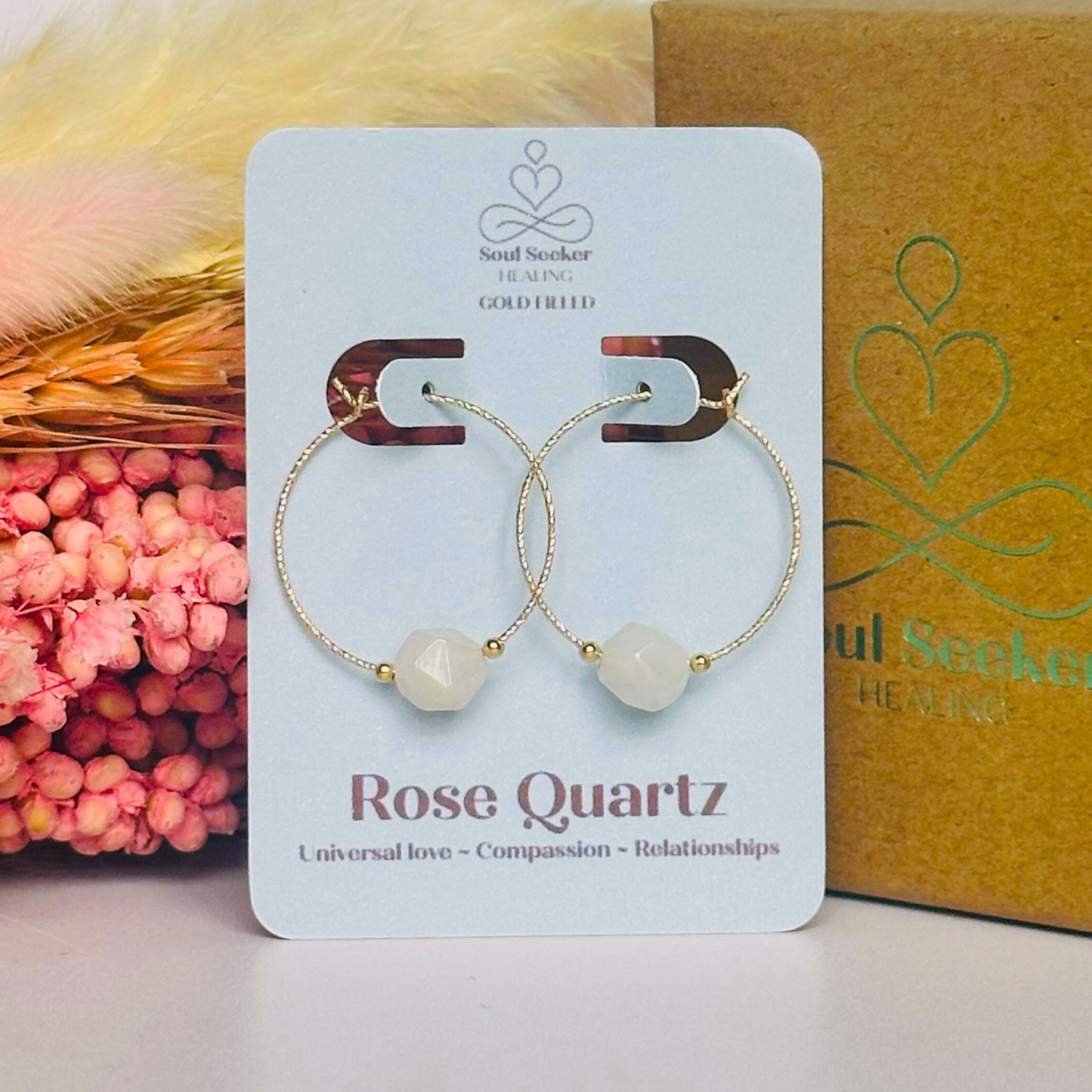 Rose Quartz gold filled hoop earrings featuring 8mm star cut rose quartz beads on 25mm sparkle cut gold filled hoops.