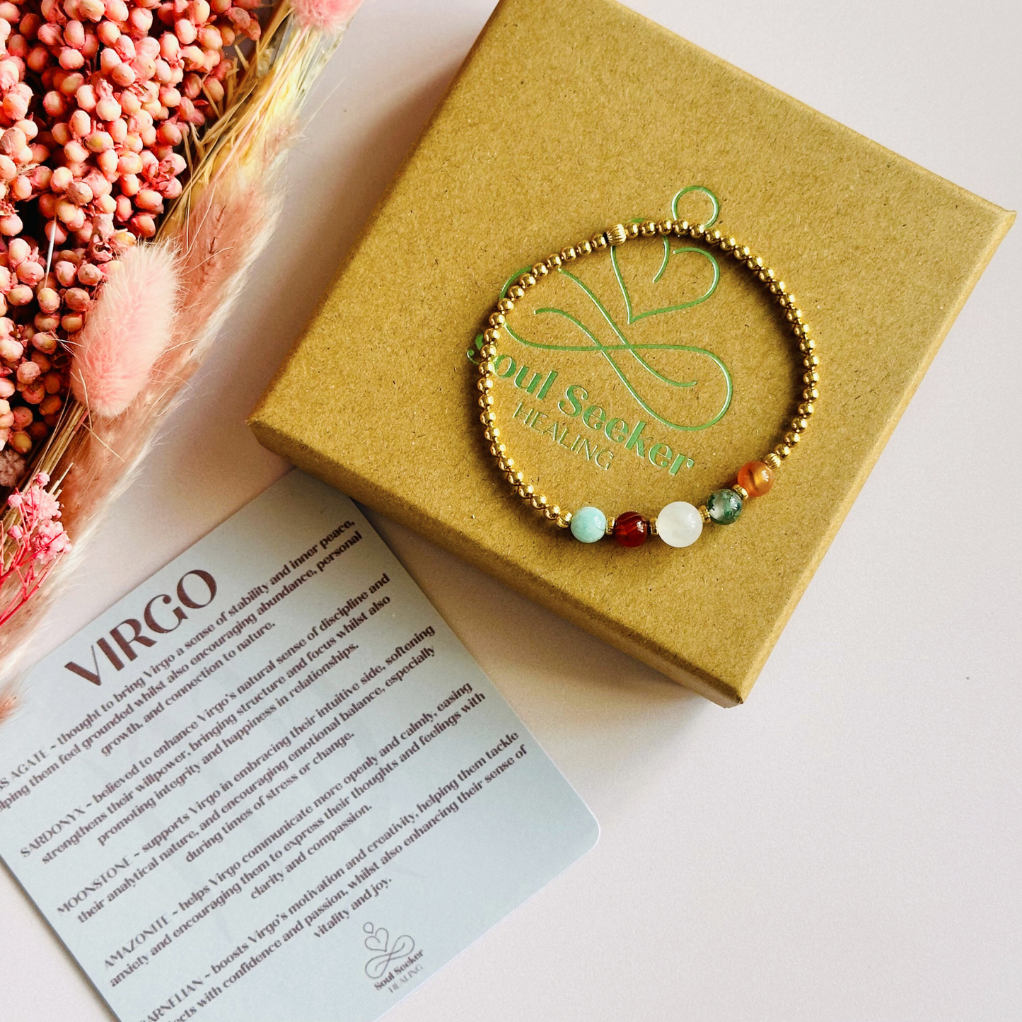 This gold vermeil Virgo bracelet is made with a selection of five healing crystals all believed to resonate with the Virgo zodiac sign. The central bead is 8mm, the other four are 6mm. On an elasticated band of 3mm gold vermeil beads with corrugated accent beads. Featuring amazonite, carnelian, moonstone, moss agate and sardonyx.