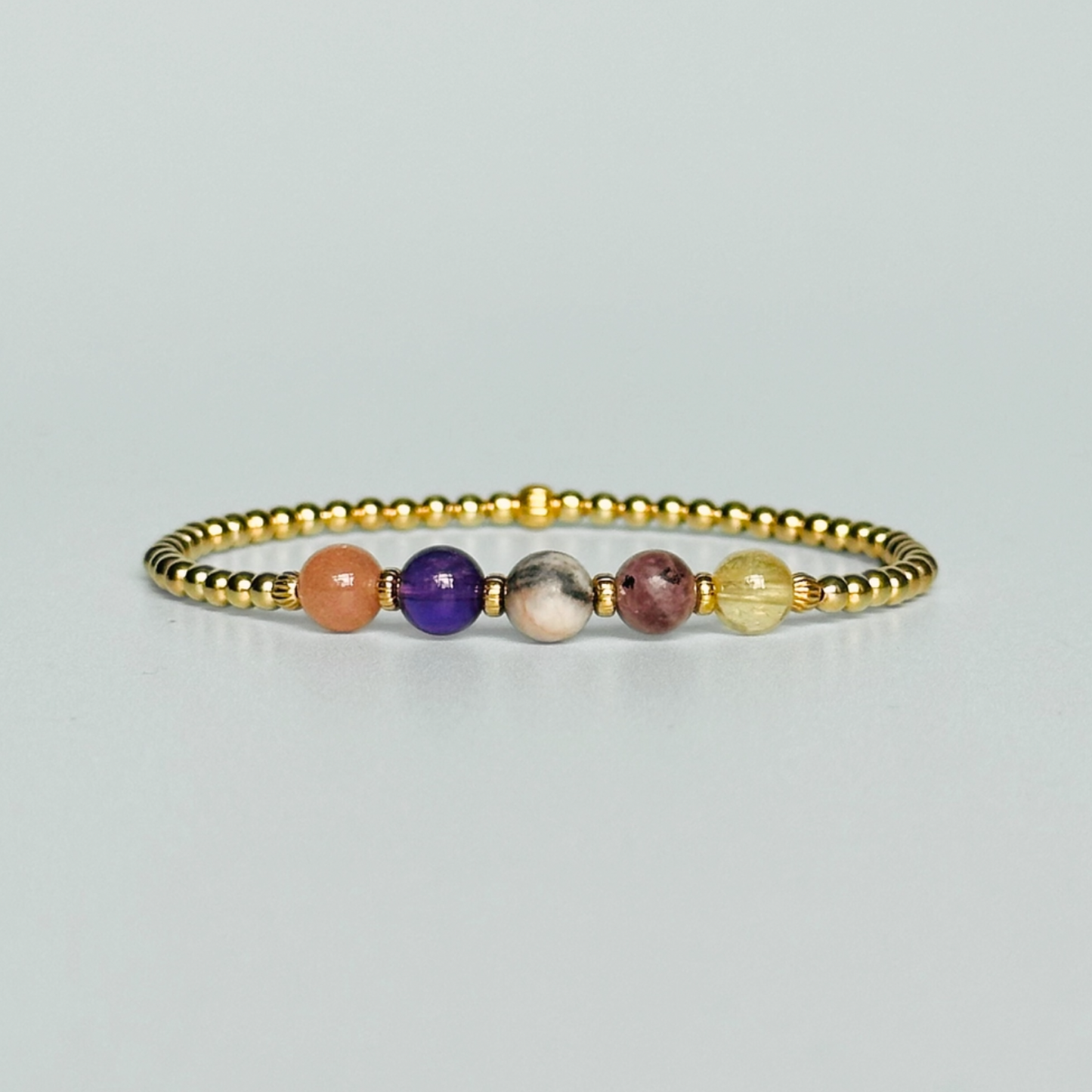This gold vermeil menopause bracelet is made with a selection of five healing crystals all believed to help deal with menopause symptoms. The crystal beads are all 6mm and are on a band of 3mm gold vermeil beads with corrugated accent beads.