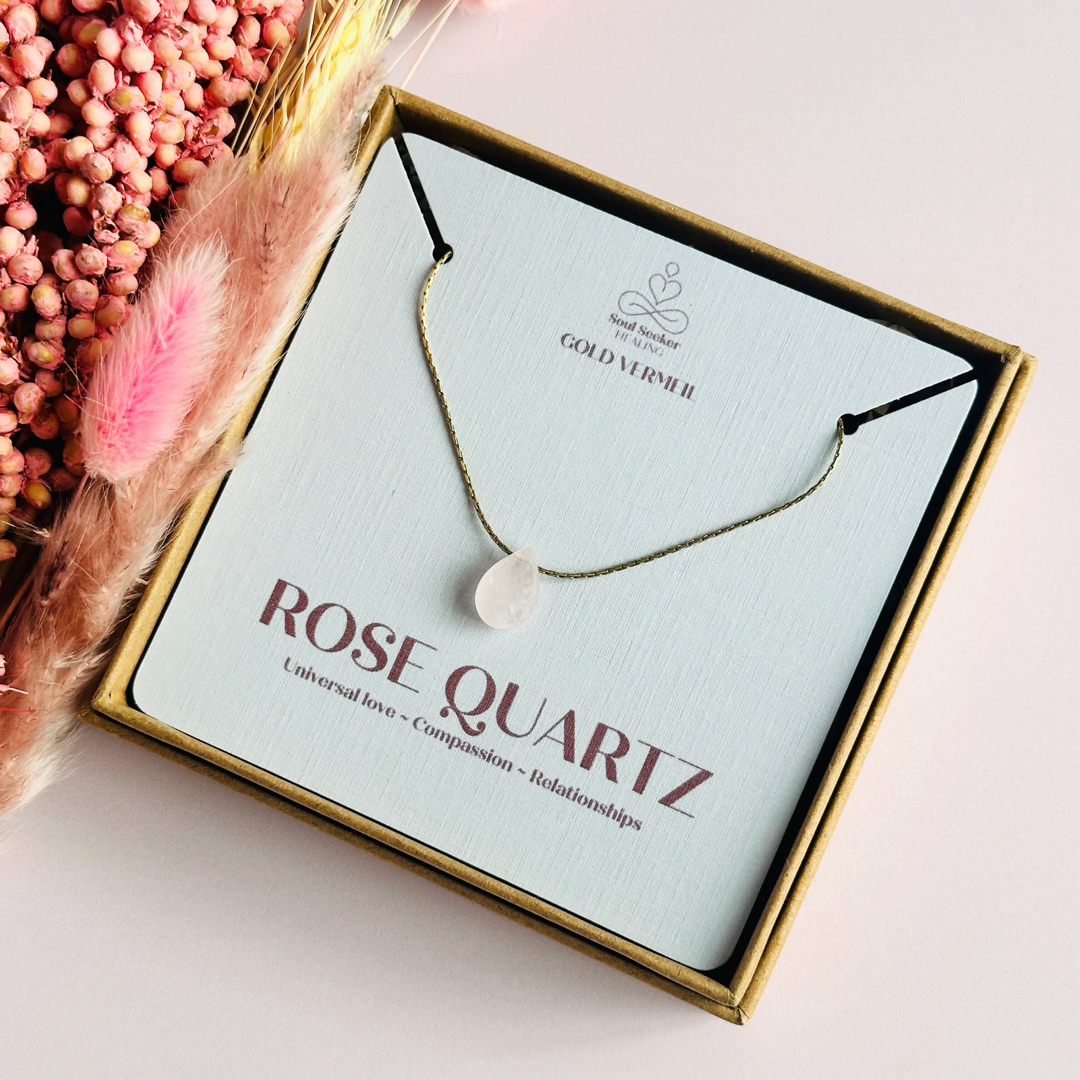 Dainty rose quartz teardrop necklace featuring a 12x8mm faceted rise quartz teardrop bead on a fine gold vermeil beading chain.