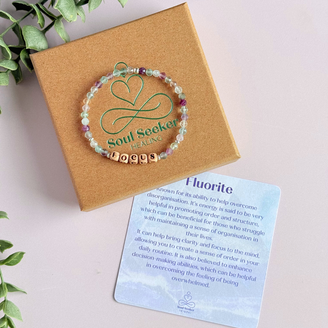 Bracelet featuring 5mm engraved wooden beads, which you can personalise with your choice of words, numbers and symbols. The main the band of the bracelet is made with 4mm faceted fluorite round crystal gemstone beads. Finished with your choice of gold vermeil, sterling silver or rose gold vermeil accent beads.