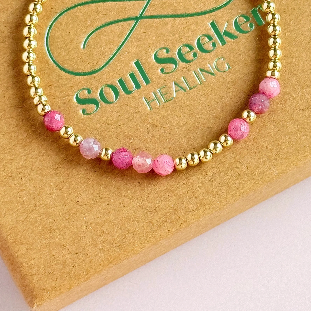 Morse code secret message bracelet spelling out your chosen name in gold filled and pink tourmaline crystal beads. Elasticated with 4mm faceted pink tourmaline beads and 3mm gold filled beads. Custom October birthstone bracelet.