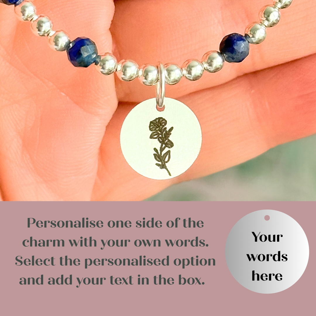 Sterling silver elasticated bracelet featuring 4mm faceted round lapis lazuli beads, separated by 3mm sterling silver round ball beads. Featuring an 11mm sterling silver round disc charm engraved with the September birth flower Morning Glory. One side of the charm can be personalised if required.