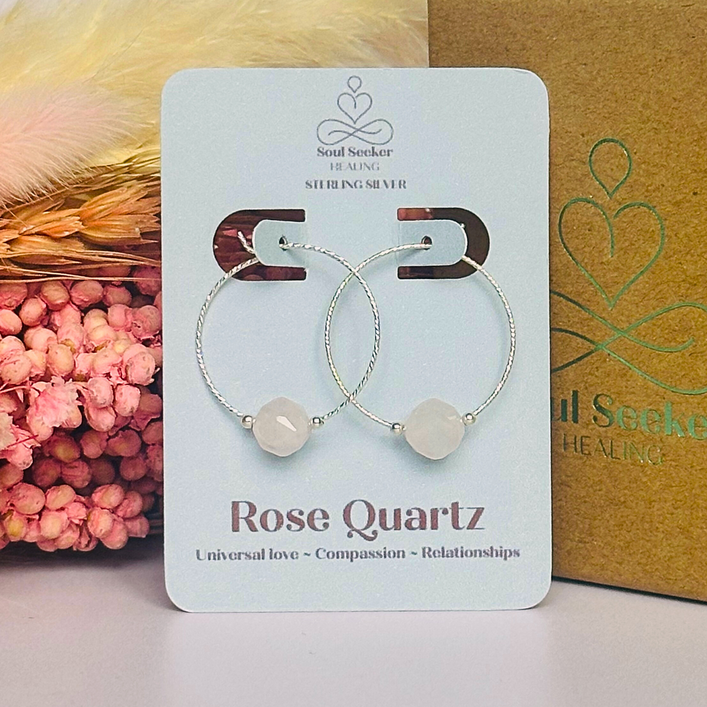 Rose Quartz sterling silver hoop earrings featuring 8mm star cut rose quartz beads on 25mm sparkle cut sterling silver hoops.