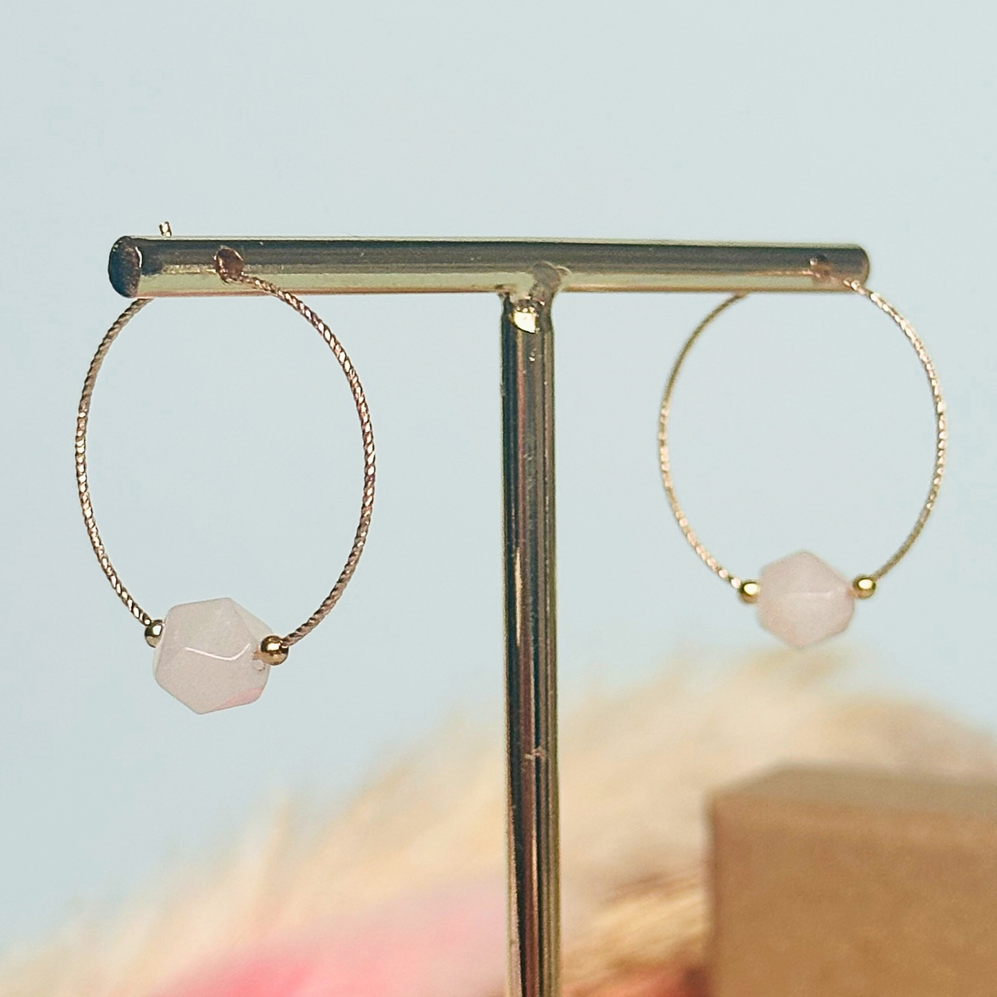 Rose Quartz gold filled hoop earrings featuring 8mm star cut rose quartz beads on 25mm sparkle cut gold filled hoops.