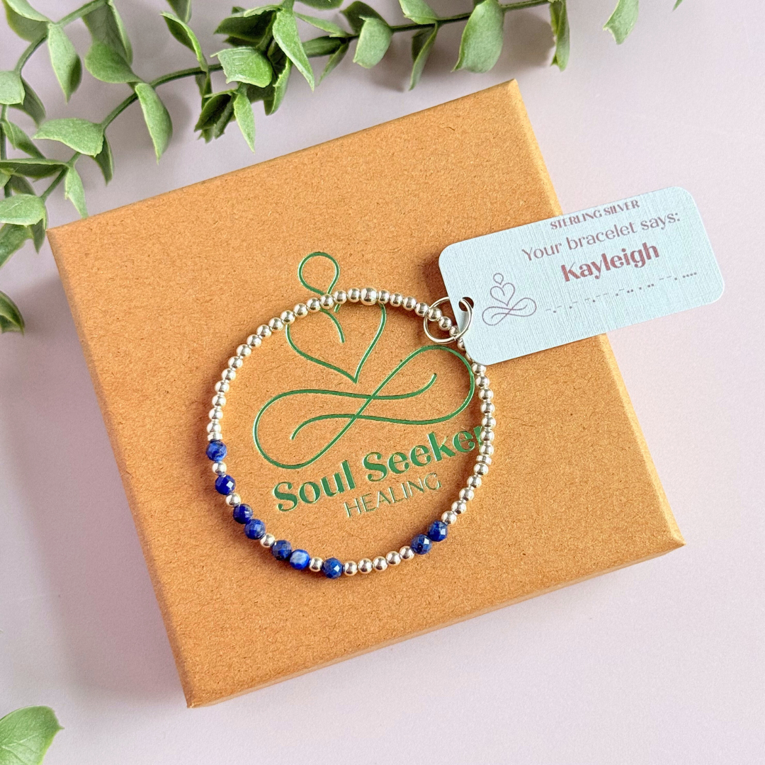 Morse code secret message bracelet spelling out your chosen name in sterling silver and lapis lazuli crystal beads. Elasticated with 4mm faceted lapis lazuli beads and 3mm sterling silver beads. Custom September birthstone bracelet.