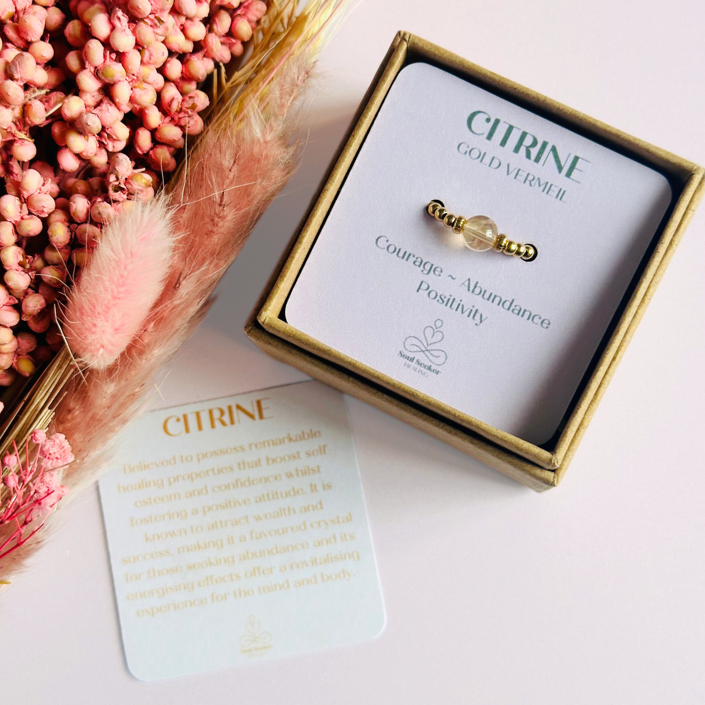 Citrine ring featuring a 6mm round citrine bead, flanked by gold vermeil rondelle beads on a gold vermeil elasticated band. November birthday ideas, November birthday gift, November birthstone ring, stretch ring, November jewellery, born in November