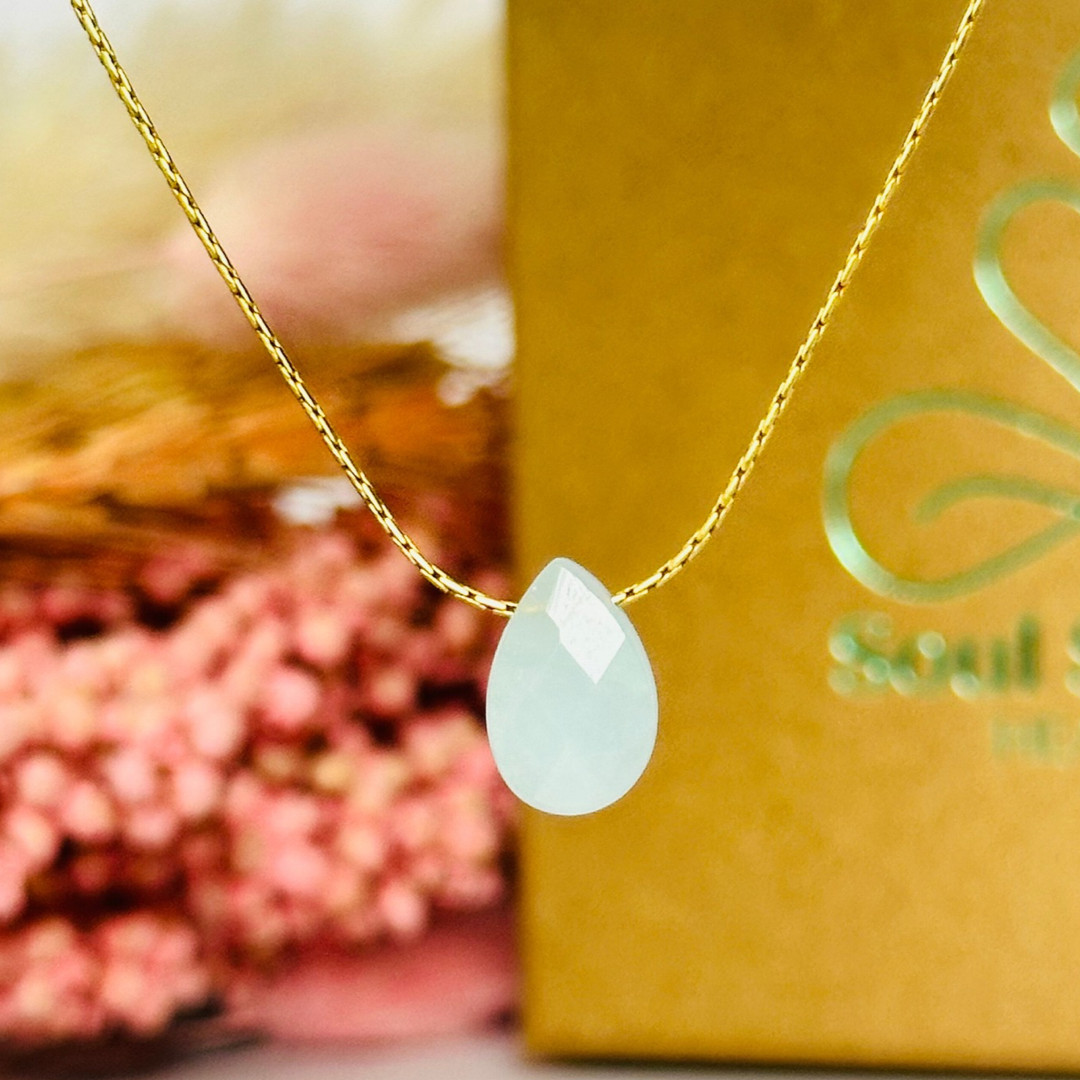 Dainty aquamarine teardrop necklace featuring a 12x8mm faceted aquamarine teardrop bead on a fine gold vermeil cardano beading chain.
