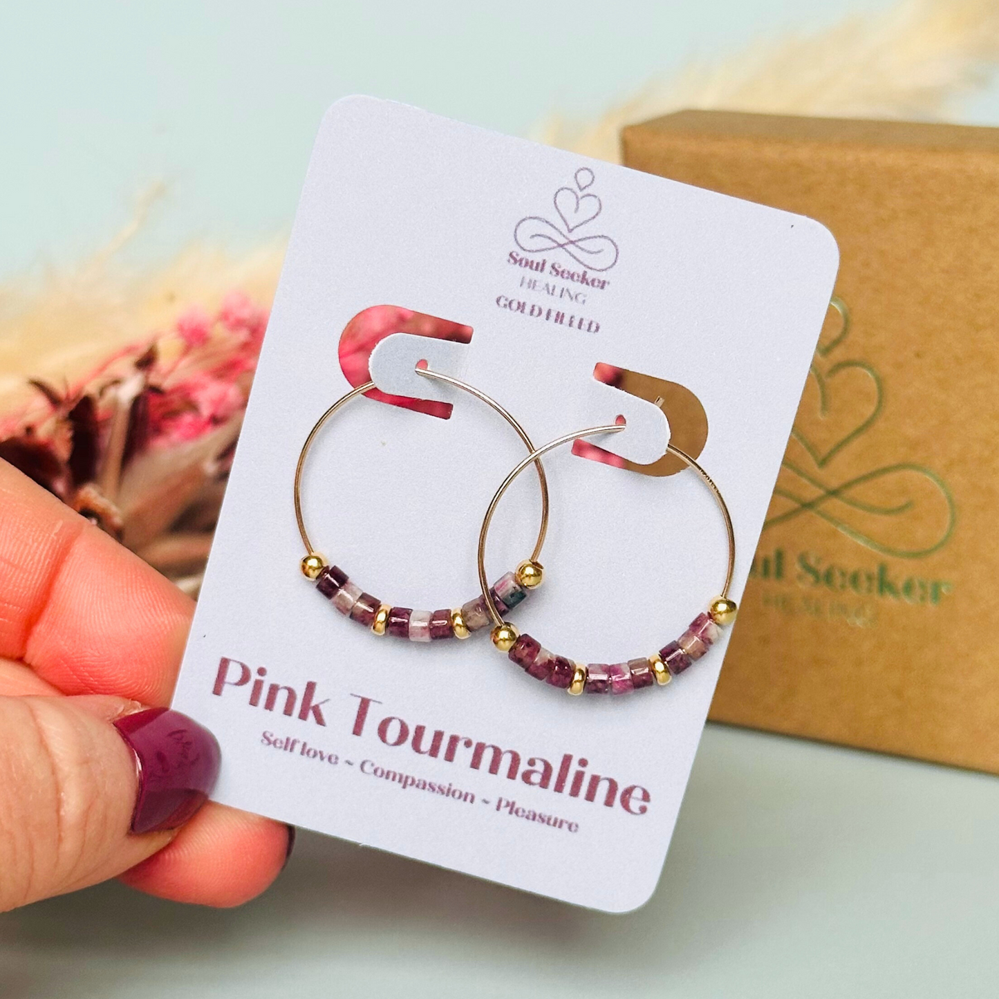 Pink tourmaline gold filled hoop earrings. Made with pink tourmaline heishi beads on 25mm gold filled hoops.