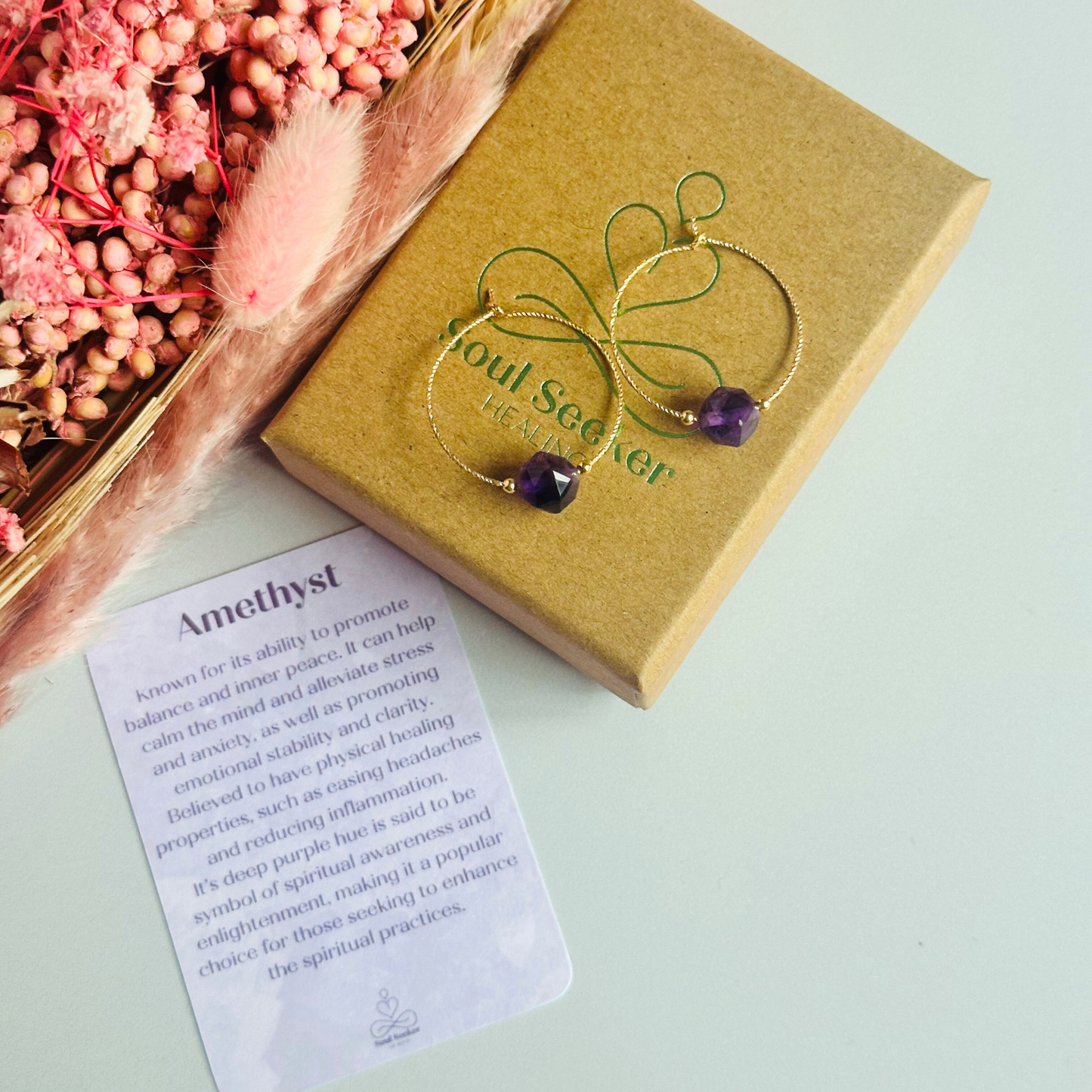 Amethyst gold filled hoop earrings featuring 8mm star cut amethyst beads on 25mm sparkle cut gold filled hoops.