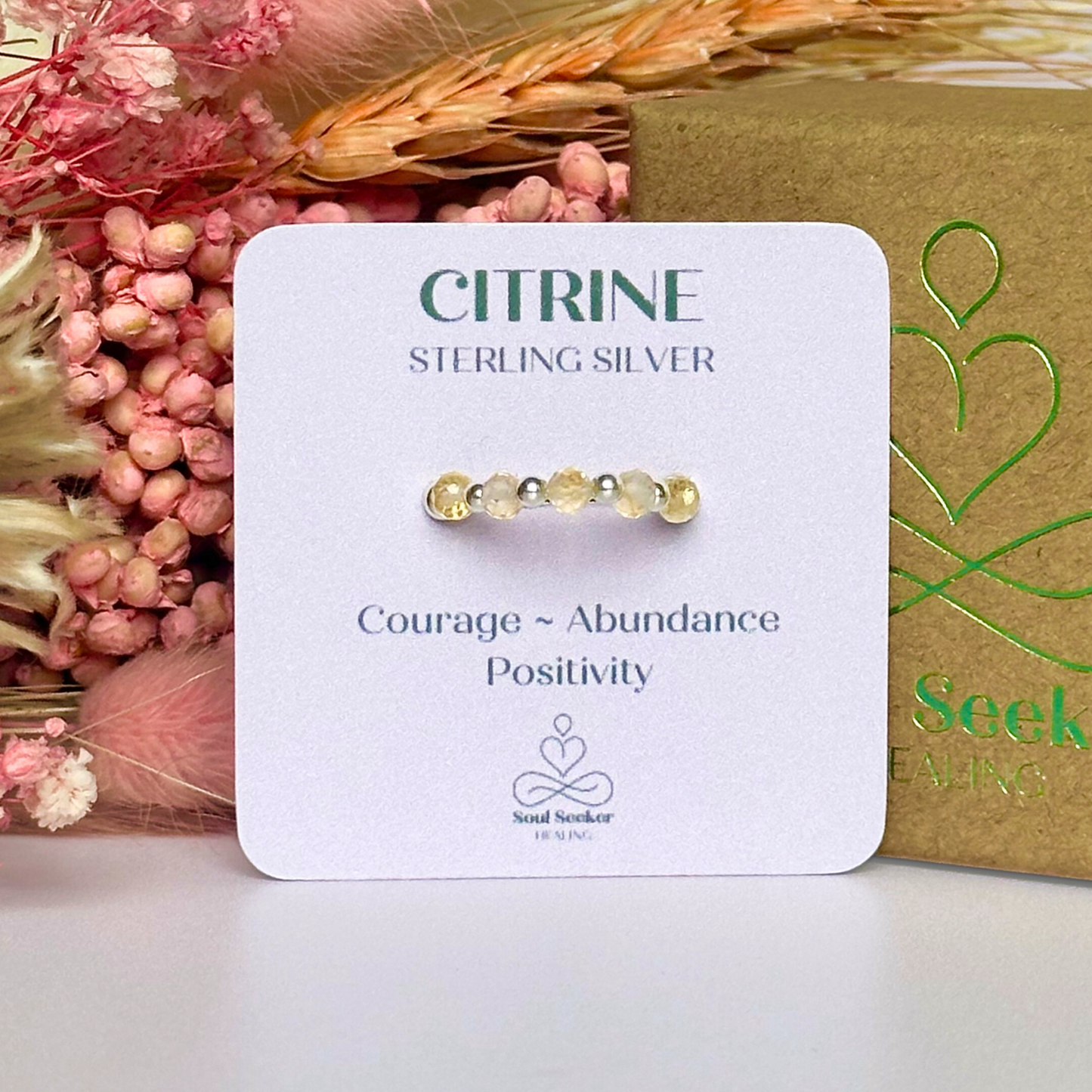Citrine ring featuring five faceted 3mm citrine beads on a sterling silver elasticated band. November birthday ideas, November birthday gift, November birthstone ring, stretch ring, November jewellery, born in November, November woman