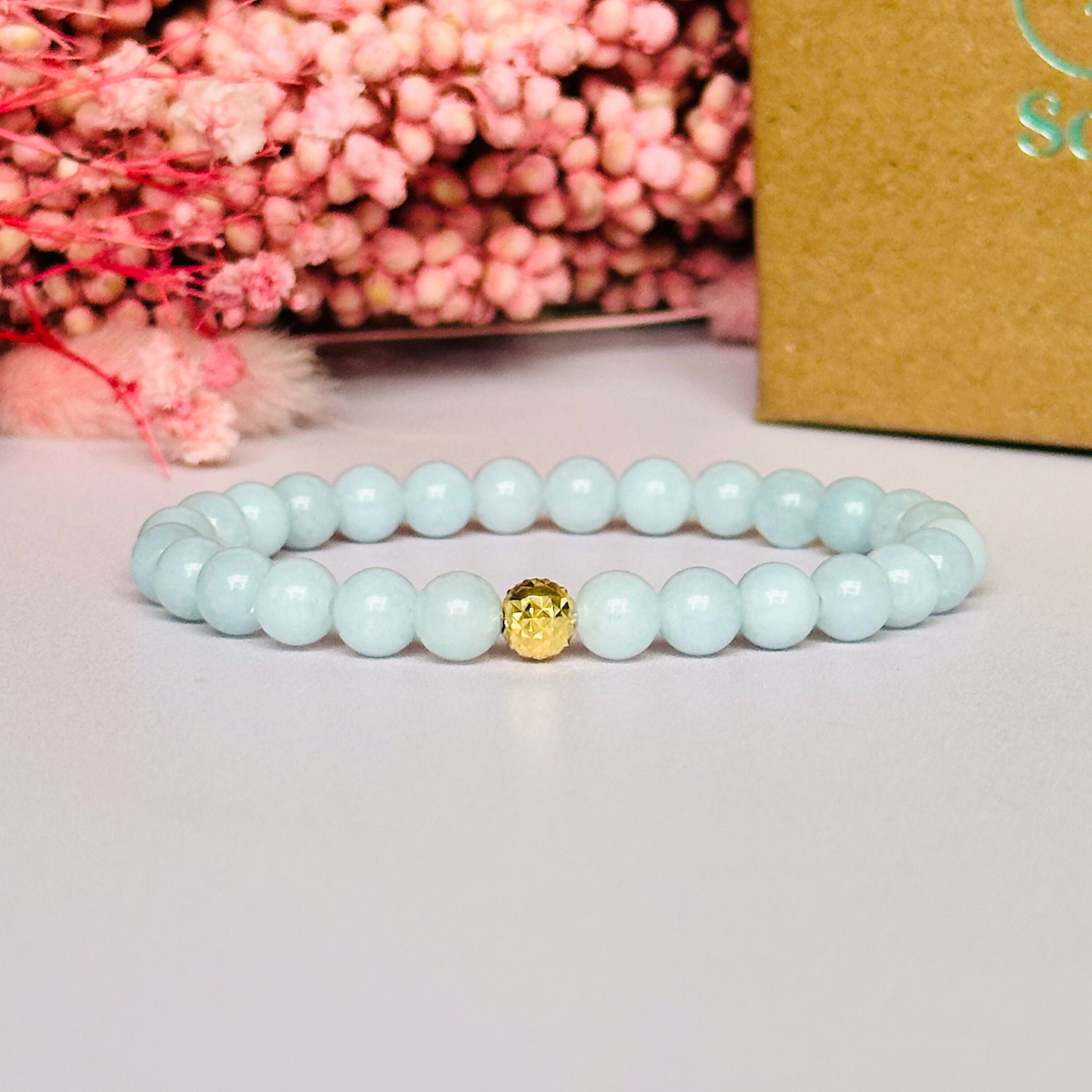 Aquamarine bracelet with a faceted sterling silver or gold vermeil focal bead. A bracelet for eternal youth. Made with 6mm beads.