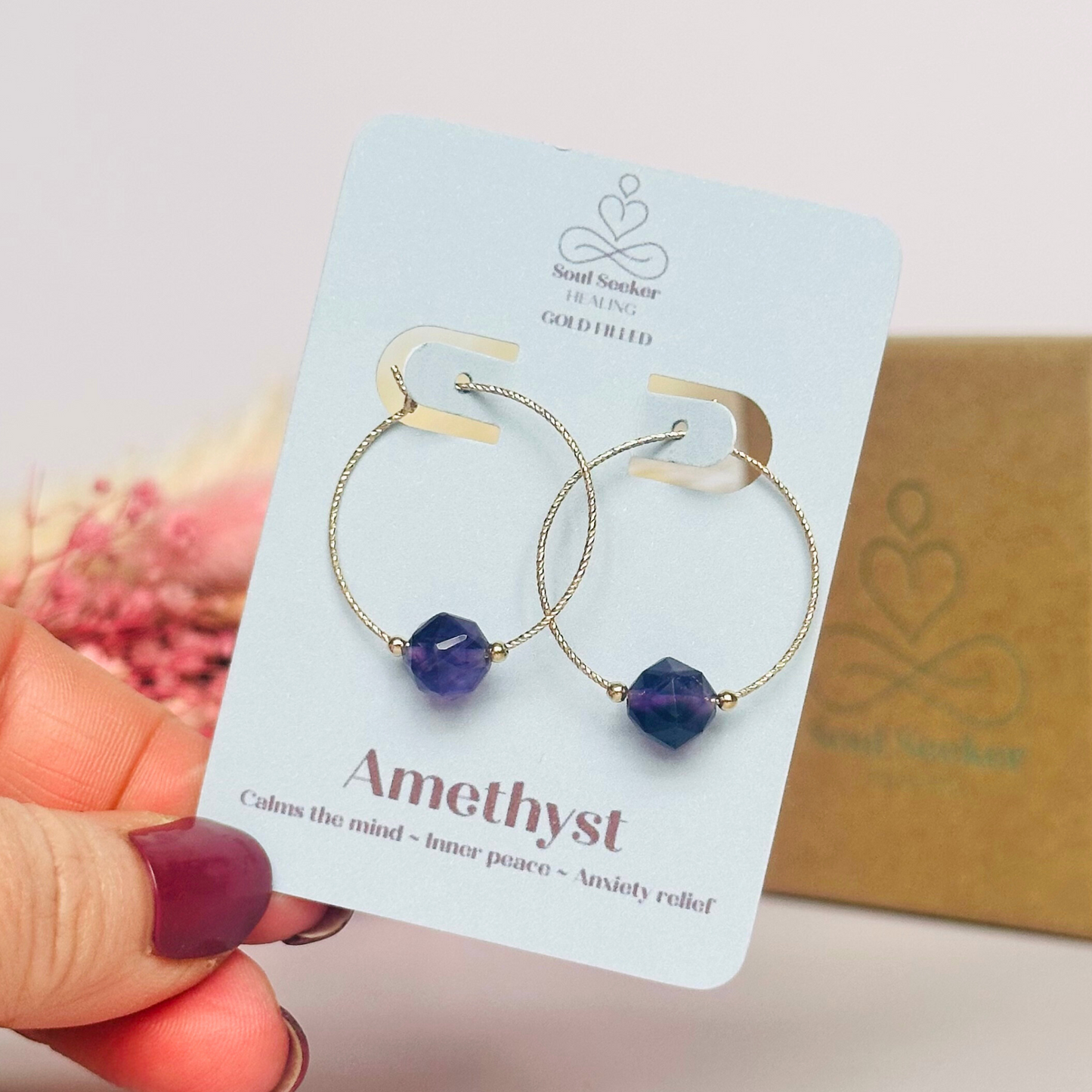 Amethyst gold filled hoop earrings featuring 8mm star cut amethyst beads on 25mm sparkle cut gold filled hoops.