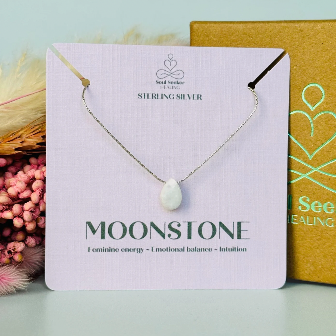 Dainty moonstone teardrop necklace featuring a 12x8mm faceted moonstone teardrop bead on a fine sterling silver cardano beading chain.