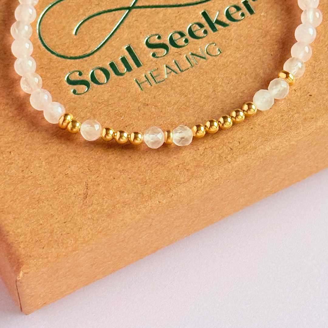 Rose quartz crystal morse code bracelet that spells out the words ‘Let them’ in a combination of 4mm round rose quartz beads, 4mm faceted rose quartz beads and either sterling silver or gold vermeil 3mm round beads. The words start and end at the rondelle spacer beads.
