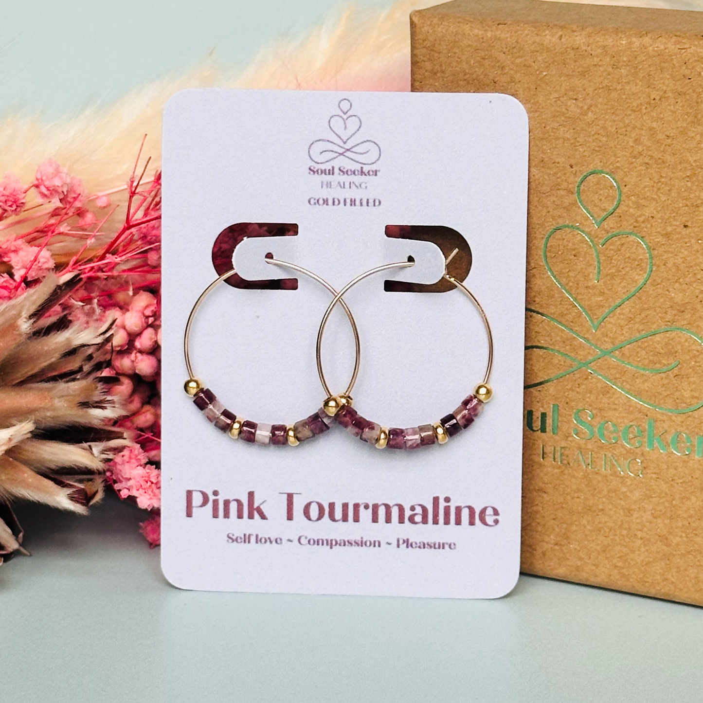 Pink tourmaline gold filled hoop earrings. Made with pink tourmaline heishi beads on 25mm gold filled hoops.