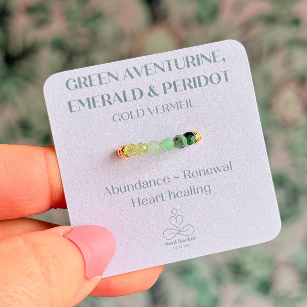 Gold vermeil band style ombré ring with multicolour 3mm faceted peridot, green aventurine and emerald beads with a beaded band of 2.5 mm gold vermeil round beads. Elasticated for comfort.