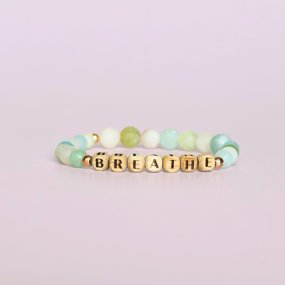 Breathwork bracelet featuring 6mm and 8mm frosted crystal beads that follow the 4-7-8 counted breathing method. Also featuring laser engraved wooden letter beads spelling out the word BREATHE. Choose your accent beads from rose gold vermeil, gold vermeil or sterling silver.