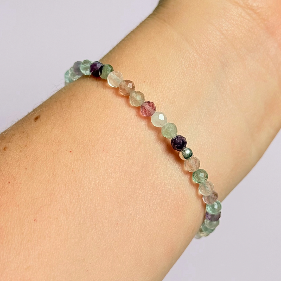 Bracelet featuring 5mm engraved wooden beads, which you can personalise with your choice of words, numbers and symbols. The main the band of the bracelet is made with 4mm faceted fluorite round crystal gemstone beads. Finished with your choice of gold vermeil, sterling silver or rose gold vermeil accent beads.