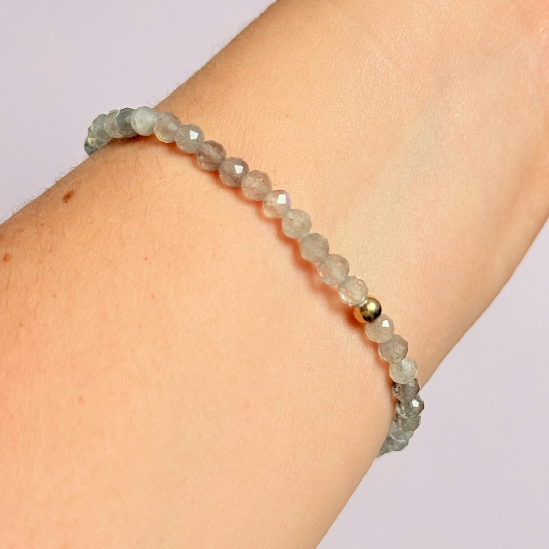 Bracelet featuring 5mm engraved wooden beads, which you can personalise with your choice of words, numbers and symbols. The main the band of the bracelet is made with 4mm faceted labradorite round crystal gemstone beads. Finished with your choice of gold vermeil, sterling silver or rose gold vermeil accent beads.