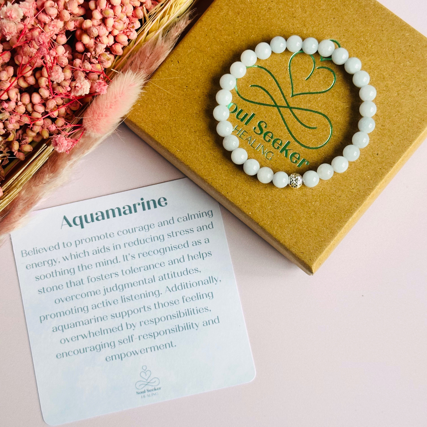 Aquamarine bracelet with a faceted sterling silver or gold vermeil focal bead. A bracelet for eternal youth. Made with 6mm beads.