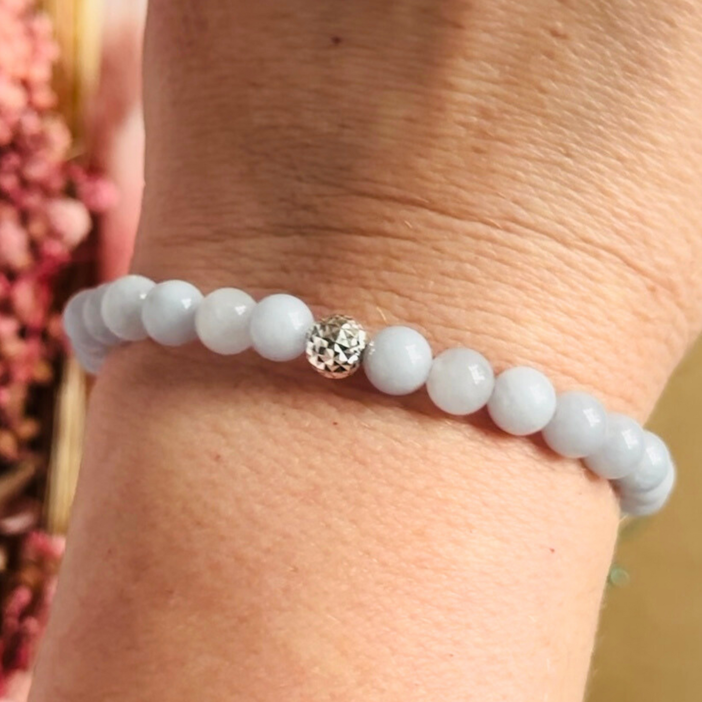 Aquamarine bracelet with a faceted sterling silver or gold vermeil focal bead. A bracelet for eternal youth. Made with 6mm beads.