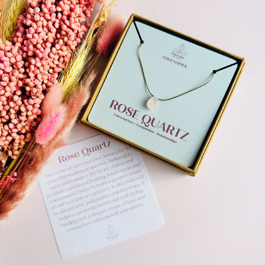 Dainty rose quartz teardrop necklace featuring a 12x8mm faceted rise quartz teardrop bead on a fine gold vermeil beading chain.