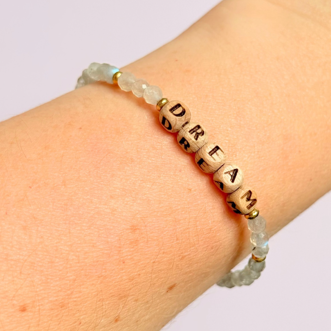 Bracelet featuring 5mm engraved wooden beads, which you can personalise with your choice of words, numbers and symbols. The main the band of the bracelet is made with 4mm faceted labradorite round crystal gemstone beads. Finished with your choice of gold vermeil, sterling silver or rose gold vermeil accent beads.