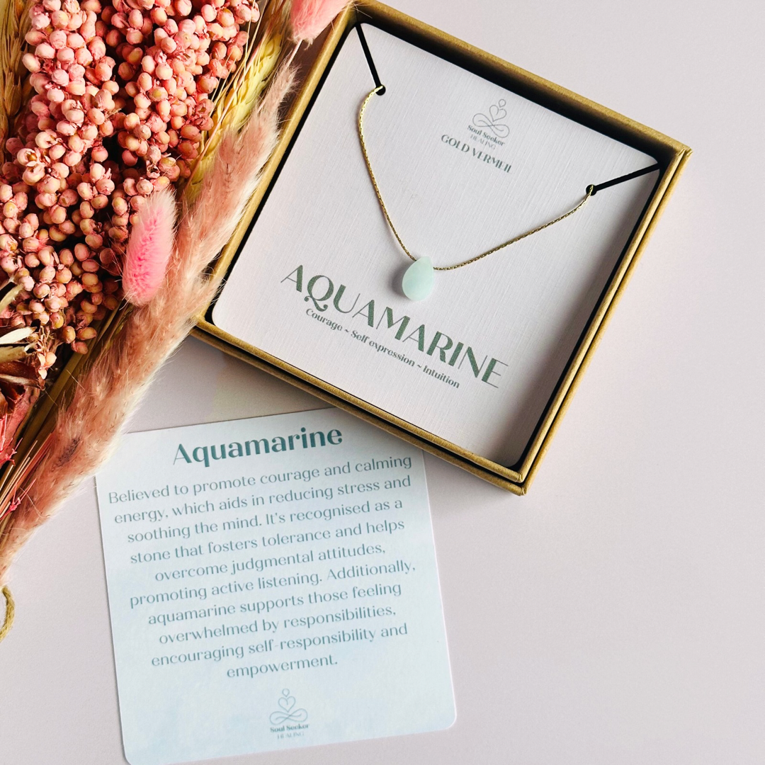 Dainty aquamarine teardrop necklace featuring a 12x8mm faceted aquamarine teardrop bead on a fine gold vermeil cardano beading chain.